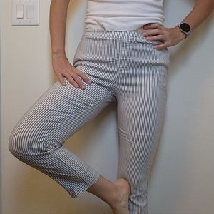 White dress pants with light blue stripes.